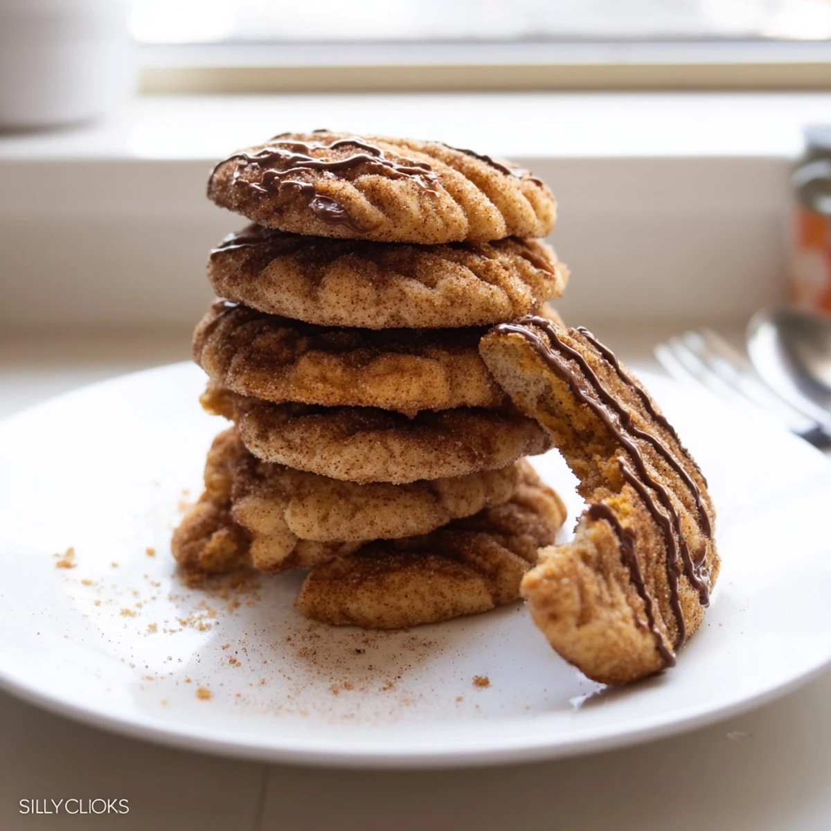 Delicious churro biscuit “silly cookies” served warm, ideal with chocolate drizzle.  