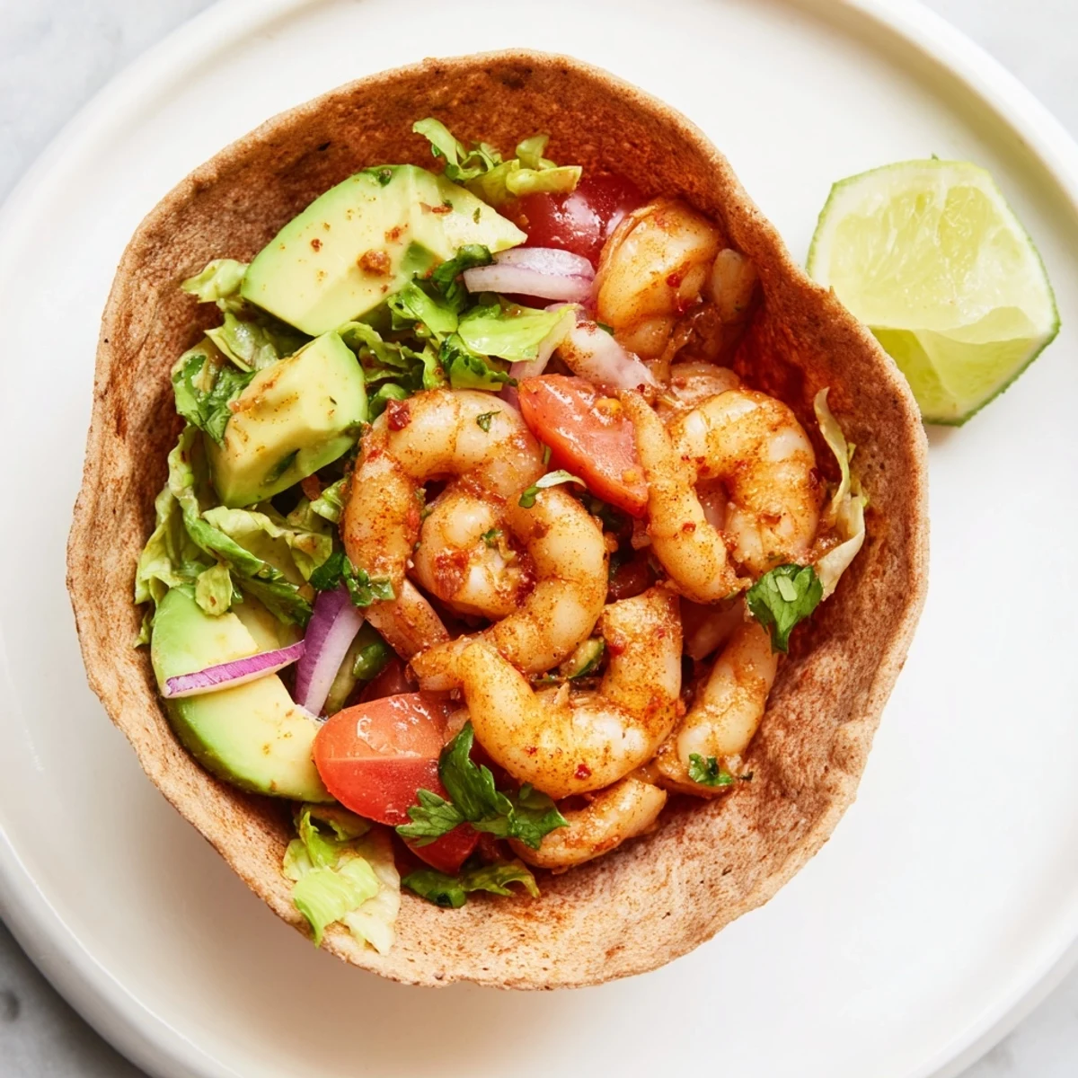 Lightened Gambas Tortilla Cups, filled with flavorful shrimp and fresh vegetables, ready to enjoy.