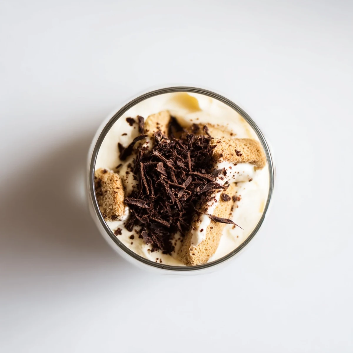 A close-up of delicious Deconstructed Tiramisu Shots, dusted with cocoa powder and ready to enjoy.
