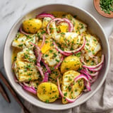 Cod and potato salad with orange vinaigrette.