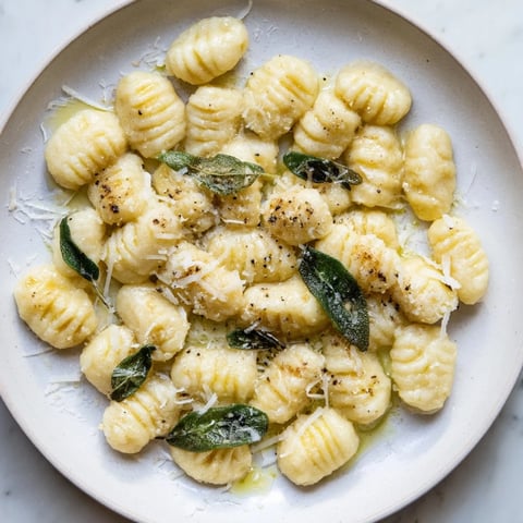 Light and fluffy homemade potato gnocchi, ready to be cooked and enjoyed with delicious sauce.