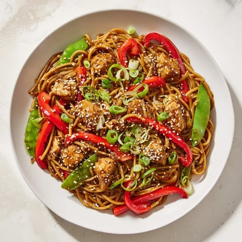 Sesame Hoisin Ground Chicken Pasta, a flavorful dish with tender chicken and vibrant vegetables.