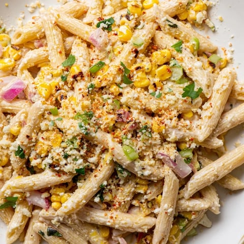 Creamy Mexican Street Corn Pasta, a flavorful vegetarian side dish with colorful vegetables.