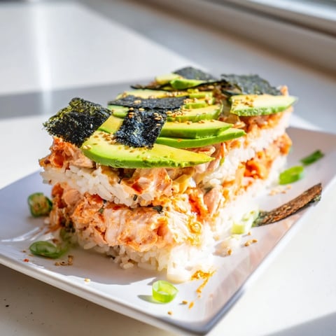 Warm, inviting Sushi Bake casserole, a comforting twist on classic sushi flavors, bubbling and golden.