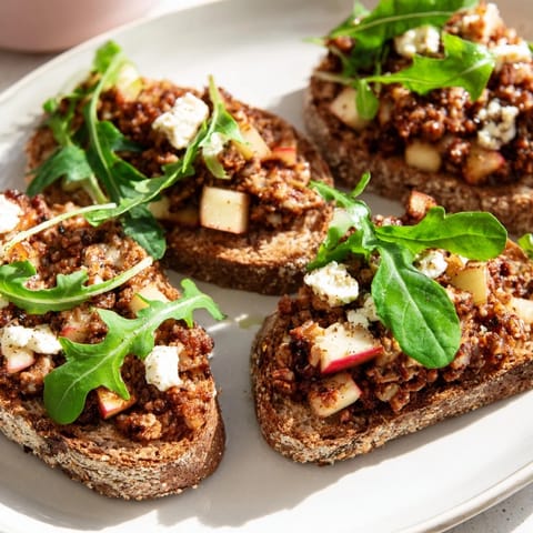 Savory Lightened Morcilla Tartine: A close-up of the delicious Spanish appetizer recipe.