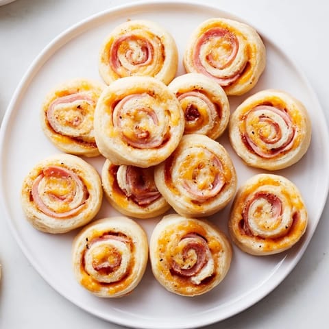 Jamon queso hojaldre enrollado