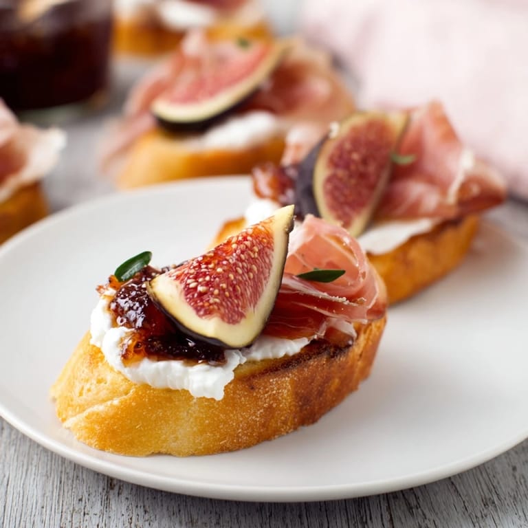 Toasted baguette slices topped with savory Jamón Ibérico and cheese comprise these elegant crostini.